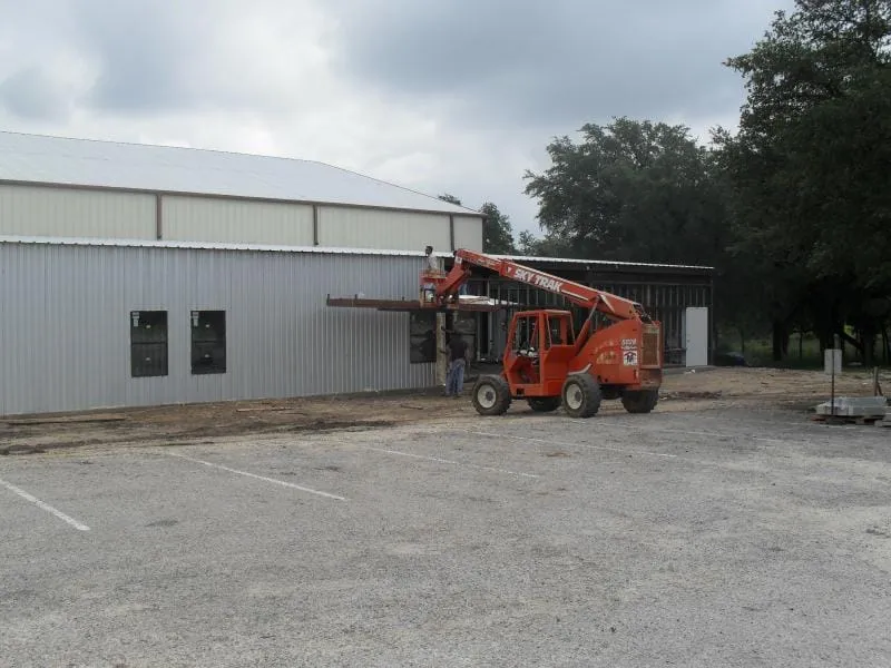 Telehandler at work during warehouse erection.